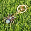 kcrygogo Antique Alloy Blue Diamond-Inlaid Spider Keychain - Fashionable Animal
