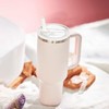 Pack of 2 cup lids, 2 straw plugs and 2
