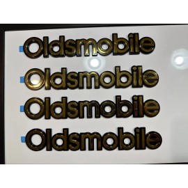 Oldsmobile New- Excellent - Gold Plated Rear Emblem Name Plate Oldsmobile Logo 10"x1.25"