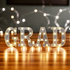MEHOFOND 2025 Graduation Decorations, 4 Grad Light Up Letters, Class of 2025 Graduation Sign Battery Operated Lights, LED GRAD Marquee Letters for High School College Graduation Party (Silver Glitter)
