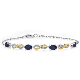 Gem Stone King - Pulsera de tenis de plata de ley 925 y oro amarillo de 10 quilates ovalada de zafiro azul y diamante blanco cultivado en laboratorio para mujer (2.27 quilates, totalmente ajustable