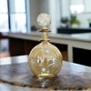 Les Trois Pyramides Gold perfume Bottle with 14 K Gold