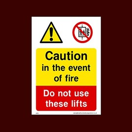 Caution in event of fire do not use these lifts Plastic Sign with 4 Pre-Drilled Holes (LE15) - Lift, Service, Pit, Dogs, Left, Right, KGS