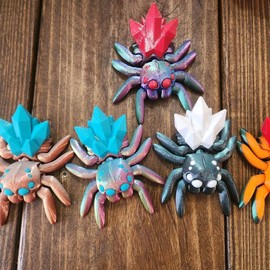 3D Printed Flexi Spiders figet toys - Color: pink/yellow with blue crystals