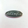 Stitch and Flick (Green/Silver) Hard Enamel Needle Minder