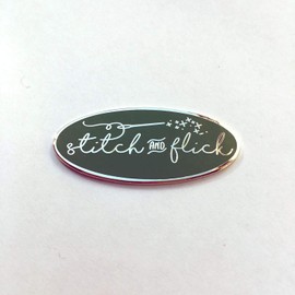 Stitch and Flick (Green/Silver) Hard Enamel Needle Minder