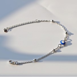 Rnivida Stainless Steel Evil Eye Bracelet for Women Minimalist Blue Evil Eye Protection Link Chain Bracelet Adjustable Size