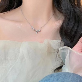 Erimberate Bohemian Crystal Bow Choker Necklace Silver Pearl Bow Pendant Necklace Cz Paved Bow Tie Necklace Rhinestone Pearl Bow Collar Necklace Jewelry for Women