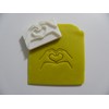 Hands into a heart stamp for many uses soap making