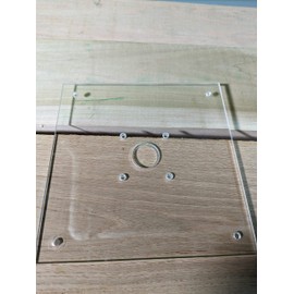 1/4" thick plexiglass base plate for Ryobi one+ PCL424B and Rigid R860443 routers with a recess for bushings. (9" square)
