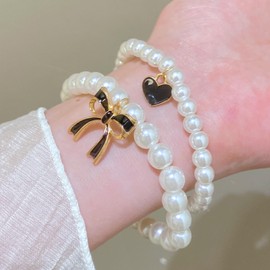GLMOCM Pearl Bow Bracelet for Women Gold Pearl Bow Charm Bracelet Pink Bow Heart Stretch Bracelet Christmas Jewelry for Women (Black)