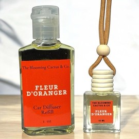 Car Air Freshener with 1 Oz Refill included | Car scented on the go | Car Air Freshener | Long Lasting Hanging Fragrance | Phthalate Free Fragrance. (Fleur D'Oranger, 10 ml)