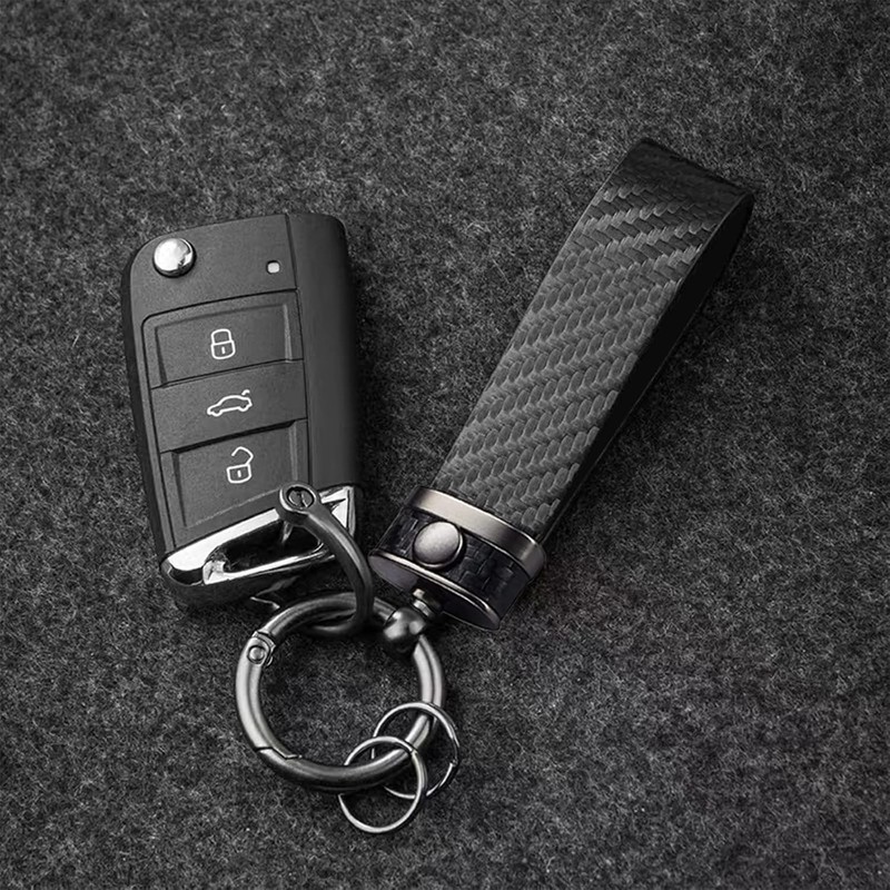 OSIFIT - Llavero de coche estilo fibra de carbono, universal,
