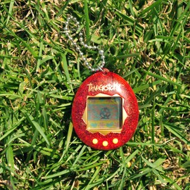 Bandai Tamagotchi Original Red Glitter Shell | Tamagotchi Original Cyber Pet 90s Adults and Kids Toy with Chain | Retro Virtual Pets are Great Boys and Girls Toys or Gifts for Ages 8+