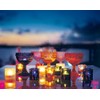 Iittala Kivi - 60mm tealight Support. Color Nuevo Transparent Red