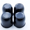 4 Push Through Black Wheel Center Caps for Trailer Wheel