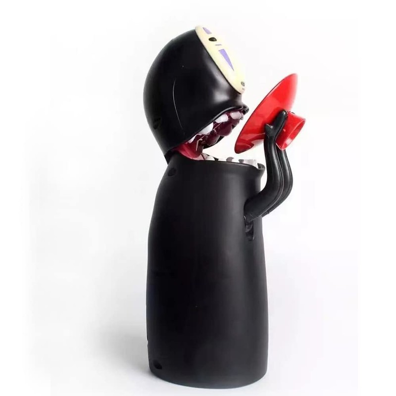 DUTTY Exquisitely crafted cartoon faceless male piggy bank, with sound
