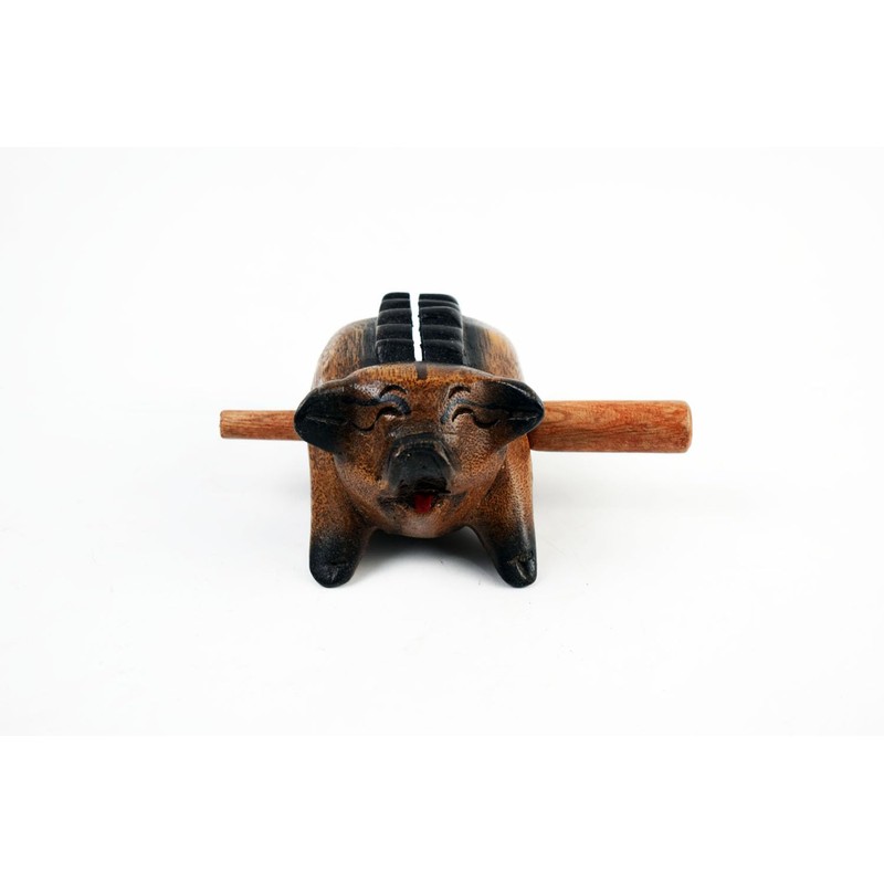 Guiro music percussion instruments wooden sound block animal croaking Pig