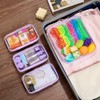 4 bolsas transparentes con cierre, funda rígida con cierre, bolsa