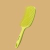 Gravity hair lifting brush for extreme volume and fine hair