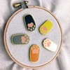 Orange Paw Enamel Magnetic Needle Minder - Tabby Tortie Cat