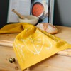 Mustard Linen Tea Towel, hand printed with hedgerow flowers. This