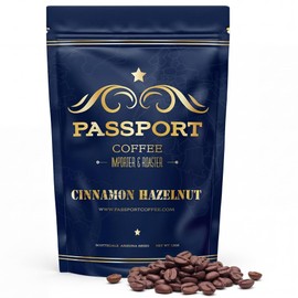Passport Coffee Cinnamon Hazelnut – Medium roast blend from Colombia & Central America. Sweet & nutty flavored with rich aroma. Premium whole bean coffee, 12oz Bag