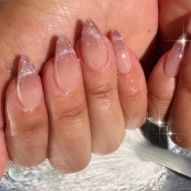 YOSOMMK Pink Cat Eye Press on Nails Almond Shaped Medium Acrylic Nails Press ons 24Pcs Glossy Cover Artificial Fake Nail with Glue Glitter Stick on False Nail for Women in 12 Sizes