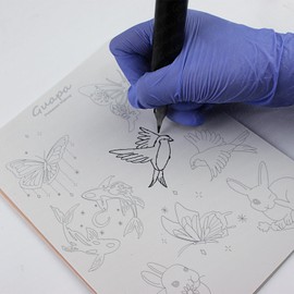 MARLLOGIVA Tiny Tattoo Practice Skin with Delicate Tattoo Patterns Tattoo Practice Skins with Design (1pc 18 Patterns)