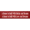 Wooden Sign - A House Is Built With Bricks &