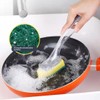 The Pot Brush with Green and Yellow Washing Pads Does