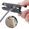 Multi-functional tool with round cable stripper, cable cutter, flat cable