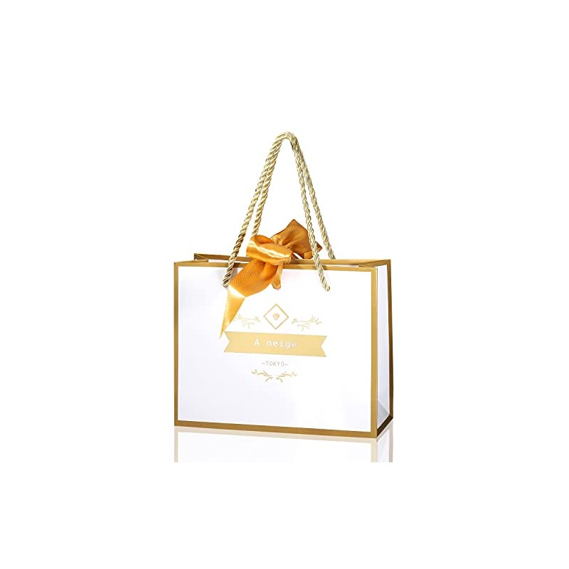 A neige Gift Bag with Gold Ribbon