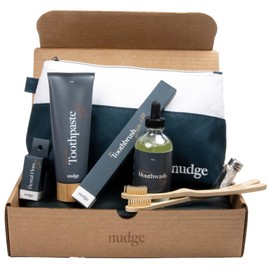 Nudge Oral Care Package: 1 x Fluoride-Free Toothpaste, 1 x Alcohol-Free Concentrated mouthwash, 2 x Bamboo toothbrushes, 1 x 100% Biodegradable Floss, 1 x Travel Toiletry Pouch