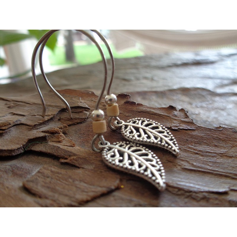Small delicate decorated leaves: unique earrings with coconut earrings