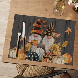 Artoid Mode Pumpkin Gnomes Leaves Fall Vinyl Placemats Set of 4, Wipeable Woven PVC Table Mats for Thanksgiving Holiday Party Kitchen Dining Decor