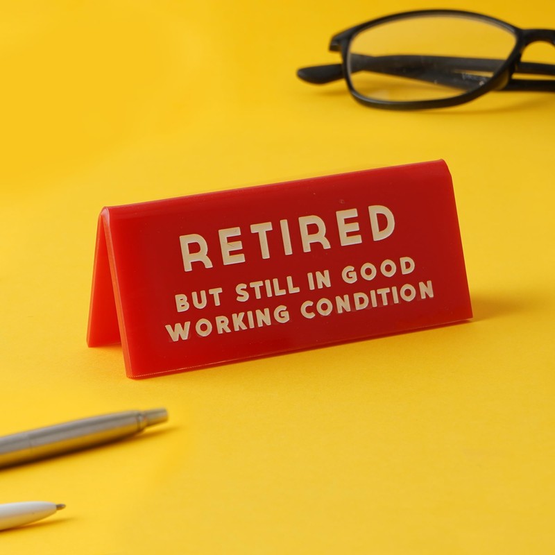CGB Giftware | Red Acrylic Desk Sign ‘Retired But Still