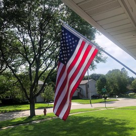 FLAGPARK American Flag 10x15 Ft Outdoor,Tough Spun Polyester US Flags for Outside 10x15,Tearproof Heavy Duty for High Wind,with Embroidered Star and Sewn Strips,All Weather
