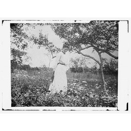 HistoricalFindings Photo: Mrs. Fred Beach,Walking Through a Field of Flowers,Smiling,1910-1915