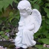 Little Angel with Consolation Teddy Holding in Arms.