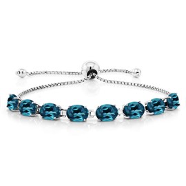 Gem Stone King - Pulsera de tenis de 8 piedras de nacimiento ovaladas de 7 x 5 mm para mujer, plata de ley 925, pulsera de bollo, totalmente ajustable hasta 9 pulgadas, fácil de poner y quitar, Una
