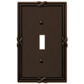 Amerelle Ribbon and Reed Single Toggle Cast Metal Wallplate in Aged Bronze
