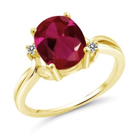 Gem Stone King 18K Yellow Gold Plated Silver Red Created Ruby and White Diamond 3 Stone Ring For Women (2.53 Cttw, Oval 10X8MM, Gemstone July Birthstone, Available In Size 5, 6, 7, 8, 9)