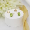 14k Yellow Gold Oval Stud Earrings with Peridot