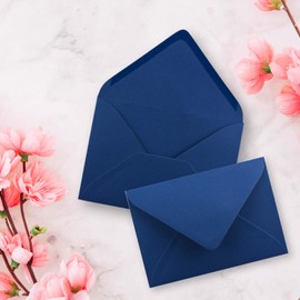 C7 envelopes, pointed flap, wet glue.