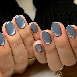 Uñas postizas cortas ovaladas color azul oscuro intenso con efecto ojo de gato, uñas postizas con acabado cromado brillante, uñas postizas cortas de g