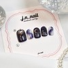 Homemade nail tips with stars in the night sky -