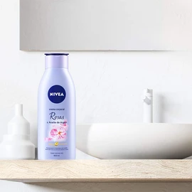 NIVEA Crema Corporal Humectante Senses Rosas y Aceite de Árgan (400 ml), 24 horas Humectación Profunda y rápida absorción delicado aroma a rosas para Todo Tipo de Piel