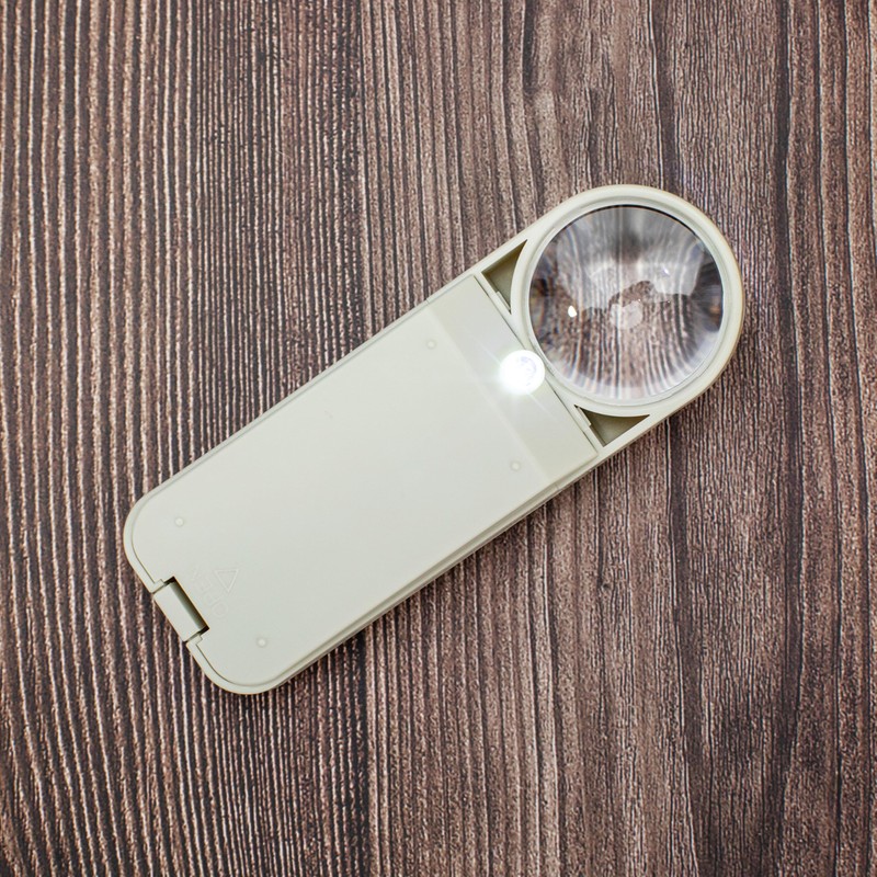 Carson Illuminated Hand Held 7x LED Lighted Aspheric Magnifier with