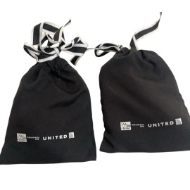 Saks Fifth Avenue NWT Saks Fifth Avenue x United Cowshed Travel Amenities Drawstring Bag Set of 2